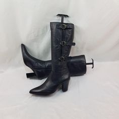 I present to your attention black women's boots with a pointed toe made of genuine leather. These vintage knee-high witchy boots are comfortable and practical. The soft leather makes these boots very comfortable. These boots with buckles are made for special women. Be the center of attention with confidence. These tall boots are guaranteed to turn heads and start conversations. Retro style that never goes out of style offers you an iconic look that will stand the test of time. In good condition, Winter Fitted Boots With Buckle Closure, Fitted Winter Boots With Buckle Closure, Gothic Leather Knee-high Boots For Winter, Fitted Knee-high Heeled Boots With Buckle Closure, Fitted Knee-high Heeled Boots With Buckle, Leather Knee-high Boots With Buckle And Pointed Toe, Gothic Heeled Boots With Pointed Toe For Fall, Gothic Knee-high High Heel Leather Boots, Winter Heeled Boots With Buckle Closure And Pointed Toe