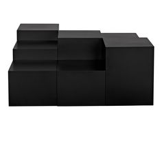 three black boxes are stacked on top of each other