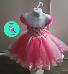 [Order] Ready to ship [About] Sweat Heart pink tutu dress with foam hearts, for children's pictures, great for birthday parties. I have recently been learning how to make ribbon trimmed tutus so my lines aren't 100% straight when sewing the ribbon, but it's not very noticeable and you can still use it for beautiful picture. selling for material cost only so I can practice 😊 [Material] Made from Crochet Tutu top and tulle [Size] Relaxed - approximately 5-6" from top to bottom and approximately 6 Summer Pink Tulle Tutu Dress, Whimsical Pink Tutu Dress For Summer, Pink Tulle Fairy Dress For Dress-up, Sweet Tulle Tutu Dress With Ruffles, Fitted Pink Princess Dress With Tulle Skirt, Sweet Pink Fitted Princess Dress, Pink Tulle Skirt Dress For Birthday, Pink Ballet Dress For Dress-up, Pink Fitted Princess Fairy Dress