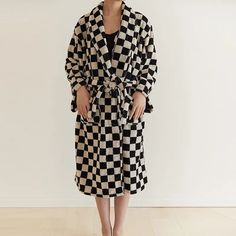 Step into comfort and style with our Checkerboard Hooded Robe, a luxurious addition to your home wear collection. Made from combed long-staple cotton, this robe features a timeless checkerboard print. Measuring approximately 44" in length and 49" wide, it fits most body types, offering a cozy and relaxed fit. The hooded design adds an extra touch of warmth and comfort. Crafted with attention to detail, this robe ensures improved water absorption and durability, making it perfect for your post-shower relaxation. Cotton Bathrobe, Womens Bathrobes, Hooded Robe, Belt Tie, Black Luxury, Women's Robe, Luxury Towels, Sleepwear Robe, Shawl Collar