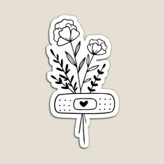 a sticker with some flowers in it on a white background and the word love is written