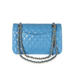 A timeless classic that never goes out of style, the flap bag from Chanel dates back to 1955 and has seen a number of updates. The design was revolutionary for its time, giving its wearers the freedom to carry their everyday must-haves without the cumbersome nature of a larger bag. The bag features the classic leather-entwined chain-link shoulder strap for a distinctive aesthetic. Item #: 128242 MSRP: 10,200 Dimensions: 10 x 6.5 x 2.5 Includes: None Exterior Material: Leather Size: Medium Circa: 2019 Exterior Color: Blue Strap Length: 9-17 Made in: France Condition: Excellent Exterior Color (Specific): Lambskin Chanel Flap Bag, Large Bag, Classic Leather, Flap Bag, Handbag Backpack, Timeless Classic, Out Of Style, Chain Link, Bags Handbags