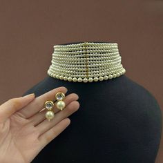 Kundan choker necklace with matching earrings Perfect for any kind of occasions and ceremonies. You can wear it with Saree lehenga and Evening Gowns. Highest quality and craftsmanship. Arrives in box Please let me know if you have any questions Elegant Choker Set For Diwali, Bollywood Style Round Wedding Choker, White Temple Jewelry Choker For Reception, White Choker For Parties And Festivals, Festive Round Choker For Wedding, Elegant Heavy White Lehenga, Festive Wedding Choker, Gold Temple Jewelry Style Lehenga For Parties, Gold Temple Jewelry Lehenga For Party