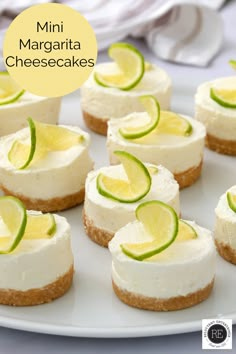 mini margarita cheesecakes on a white plate with lime slices around the top and bottom