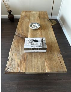 a wooden table with a book on it