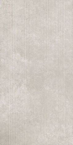 an image of a white textured wallpaper with vertical lines on the bottom and sides