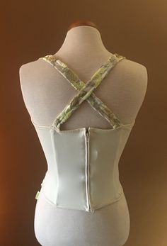 "Beautiful and unusual camisole accented with metallic floral appliqués. The top is made of nylon and Lycra for a slimming effect. Staves are added for a mild support and to maintain a slimming look. Top can be worn with jeans as well as slacks or skirt. Measures 16\" from armpit to armpit 10.5\" from armpit to hem 13\" across the waist This top has a lot of stretch!" Flora Nikrooz, Mercury Glass Christmas Ornaments, Top Bustier, Bustier Top, Dress Top, Top Dress, Columbus, Halter Top, Womens Tank