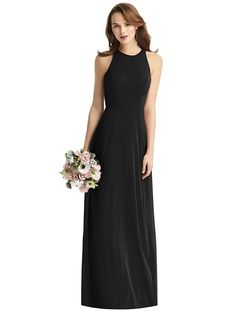 a woman wearing a black bridesmaid dress and holding a bouquet in her hand