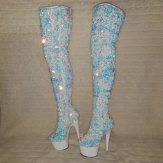 7" (178mm) Heel, 2 3/4" (70mm) Platform Stretch Sequin Thigh High Boots Multi Sequined Body, Inner Side Zip Closure With top Elastic gusset for more room if needed 31" Tall including heel New in Box Authentic Pleaser Brand item IN STOCK NY WAREHOUSE Email us with any questions or Concerns BEFORE Placing Your Order.Last but not least, we want all of our customers HAPPY and to LOVE your new shoes!So if you have a problem, please let us know.YOU ARE IMPORTANT and we will do our best to fix what is Sequin Thigh High Boots, Caves Collect, Crazy High Heels, White Thigh High Boots, Platform Thigh High Boots, Thigh High Platform Boots, Prom Dresses Long Lace, Glitter Boots, Black High Heel Boots