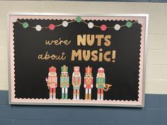 a bulletin board that says we're nuts about music with nutcrackers