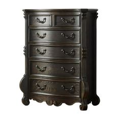 an ornate chest of drawers with many drawers and handles on each drawer, all in dark wood