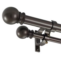 an image of a curtain rod with two balls on the top and one ball on the bottom