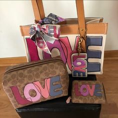 New With Tags Coach Love Tote With Accessories! Coach Silk Scarf Coach Wallet Coach Keychain Coach Charm Coach Cosmetic Bag Sold Dust Bag Pet And Smoke Free Home Coach Keychain, Pink Hoodie Victoria Secret, Coach Wallet, Pink Hoodie, Silk Scarf, Coach Bags, Victoria Secret, Cosmetic Bag, Dust Bag