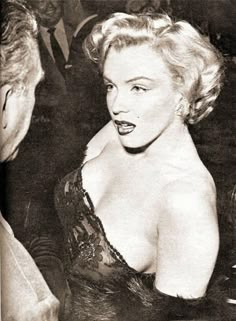 an old black and white photo of marilyn monroe