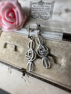 https://www.instagram.com/poplife.lv/ * Rennie Mackintosh design sterling silver dangling earrings made by Carrick Jewelry Limited  * made in Edinburgh, sterling silver * 3,5cm length * weight 2,92g * condition extremely good  * shipping included in price  standard tracked shipping from Latvia (approximately 7-16 days delivery, depending of the recipient's location)  * sometimes delays could happen because of postal work problems * returns are not accepted - ask for more videos, photos, measurem Work Problems, Mackintosh Design, Rennie Mackintosh, Dangling Earrings, Latvia, Edinburgh, Favorite Jewelry, Jewelry Earrings Dangle, Etsy Earrings