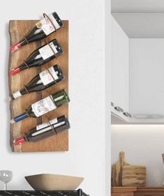 a wooden shelf with wine bottles on it