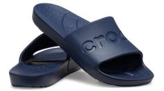 This simple, easy to wear slide offers essential Crocs comfort and style at an amazing price. A sleek upper features the Crocs logo, and a fully molded Croslite™ design makes it lightweight and comfortable. An everyday slide sandal that’s so perfect, you’ll want multiple pairs!  Crocs Slide Details:    Sleek upper featuring Crocs logo   Incredibly light and easy to wear   Fully molded Croslite™ material for signature Crocs comfort Crocs Logo, Crocs Slides, Slide Sandals, Sleek, Sandals, How To Wear, Design