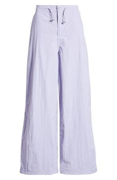 Fall for the silhouette of these wide-leg pants designed with a drawcord waist. Zip fly with button closure; drawcord waist Unlined 60% rayon, 40% polyester Machine wash, line dry Made in USA Cotton Straight Culottes For Spring, Casual Culottes For Spring Daywear, Casual Spring Daywear Culottes, Casual Spring Culottes For Daywear, Spring Workwear Parachute Pants With Elastic Waistband, Spring Parachute Pants With Elastic Waistband For Work, Spring Daywear Wide Leg Culottes, Spring Wide-leg Relaxed Fit Parachute Pants, Spring Daywear Wide-leg Culottes