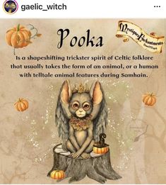 an animal with wings sitting on top of a tree stump in front of pumpkins