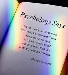 an open book with the words'psychology says'in rainbow - hued light