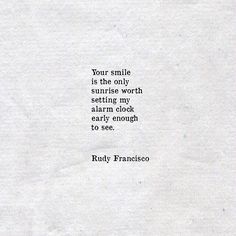 a white piece of paper with a quote on it that says, your smile is the only sunrise worth setting my alarm clock early enough to see