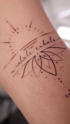 a woman's arm with writing on it