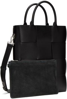 Intreccio-woven buffed calfskin tote in black. · Twin rolled carry handles · Detachable and adjustable post-stud shoulder strap · Logo embossed at side · Open throat · Detachable zip pouch at interior · Suede lining · H14.5 x W11 x D3.5 in Supplier color: Black/Silver Black Calf Leather Shoulder Bag With Handles, Square Leather Bag With Intrecciato Weave, Leather Square Bag With Intrecciato Weave, Modern Woven Leather Shoulder Bag For Work, Designer Business Shoulder Bag With Braided Handles, Business Tote Shoulder Bag With Intrecciato Weave, Designer Shoulder Bag With Braided Handles For Business, Luxury Woven Leather Bag For Work, Business Shoulder Bag With Braided Handles