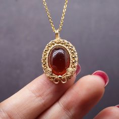 Elegant Gold Garnet Cabochon Jewelry, Handmade Amber Necklaces For Wedding, Heirloom Handmade Brass Necklace, Gold Handmade Heirloom Necklace, Handmade Gold Heirloom Necklace, 14k Gold Wire Wrapped Necklace As Gift, 14k Gold Wire Wrapped Necklace For Gift, Gold Heirloom Handmade Necklace, Handmade Heirloom Gold Necklace