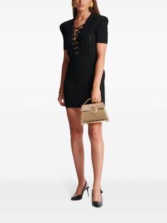 Find BALMAIN Lace-up Mini Dress on Editorialist. This Balmain mini dress features a V-neck, lace-up detailing, short sleeves, and a straight hem. It has gold-tone hardware, eyelet detailing, and lace detailing. It fastens with a rear zip and has a thigh-length silhouette. Black Minidress, Balmain Collection, Classic Wardrobe Staples, Water Consumption, Classic Wardrobe, Mens Fall, Neck Lace, Harmful Chemicals, Sweaters Knitwear