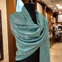 Hello Dear customers, First of all, I want you to know that both my hand-woven green silk shawl, the crystals I used, and most importantly, the quality of the handcraftsmanship used to create them, have been evaluated by you and they have always proven themselves by receiving full marks. To elaborate a little, this aqua green shawl or wrap, which is 100% hand-woven silk, is among the highest quality in its class. It is a light and semi-shiny shawl suitable for use in all seasons. It can also be used as a scarf if desired, without any problems, even though it is crystalline. A very valuable customer of mine commented on this issue and shared photos. Please check. Now let's talk about the changes. Before, I could not dare to use crystals of different colors. However, in this aqua green shawl Elegant Green Embroidered Shawl, Luxury Pashmina Shawl For Festive Occasions, Elegant Festive Pashmina Dupatta, Green Pashmina Shawl For Wedding, Festive Green Shawl, Elegant Blue Pashmina Shawl For Festivals, Elegant Raw Silk Shawl Dupatta, Elegant Dupatta Scarf, Green Shawl Scarves For Festive Occasions