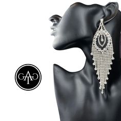 Make a dazzling statement with VALENTINA Chandelier rhinestone Statement Evening Earrings! These earrings are designed to captivate and command attention. Featuring clear rhinestones on a stunning silver base, they exude a sense of elegance and glamour. With a length of 5.9" (14.98cm) and a width of 1.8" (4.57cm), these earrings are designed to stand out and elevate your stage presence. The post back with a push back circle closure ensures a secure and comfortable fit, allowing you to strike you Evening Earrings, Stage Presence, Inner Goddess, Rhinestone Bracelet, All That Glitters, Clear Rhinestones, Chandelier Earrings, Bracelet Sizes, Clear Crystal