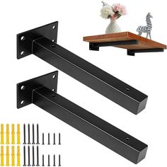 two black metal brackets with screws and yellow pins next to each other on a white background