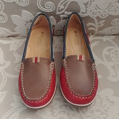 Red, Blue, And Tan Leather Loafers From N5 Comfort Naturalizer. Style Is Hanover. White Stitching And Trim Along Sides Of Each Shoe. Tan And White Fabric Lining. Sueded Style Comfort Footbed. Rubber Sole. Size 6.5 M. A Few Scuff Marks On Each Shoe. However, These Are Brand New In The Box And Have Not Been Worn Except To Try On. Will Be Shipped In The Original Box, Which Is Somewhat Distressed (Please See Last Photo). Please Ask Questions. Reasonable Offers Are Welcome. Red Loafers, Naturalizer Shoes, White Fabric, White Fabrics, Leather Loafers, Try On, Tan Leather, Flat Shoes Women, Loafer Flats