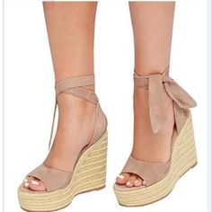 Style: Casual. Fashion. DailyColor: Beige. Pink. Black. NavyType: Classic Ankle Cross Strap SandalsHeight: Wedge Heel approx 3.2'' ; Platform heel approx 1.25''?Toe: Open Round ToeUpper Material: Faux SuedeHigh platform wedged heel design make your legs looked more skinnier and longer. also keep you comfortable wear all day.Perfect for your everyday wear and style these with your favorite shorts. skirts. dress and so on. Beach Season Wedge Sandals With Round Toe, Adjustable Ankle Strap Wedge Sandals For Summer, Casual Ankle-high Wedge Sandals For Summer, High Heel Summer Wedge Sandals, Trendy Closed Toe Wedge Sandals With Wrapped Heel, Adjustable Wedge Sandals For Summer Parties, Summer High Heel Wedge Sandals, Beige Heels For Beach Summer Occasions, Summer Adjustable Wedge Sandals With Round Toe