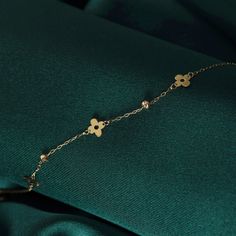 14k Solid Gold Clover Luck Bracelet for Women ❤️ Four Leaf Clover 14k Bracelets, Lucky Bracelet Gift for Her ITEM DETAILS Material:14K Solid GOLD (Not filled or plated). Gold Bracelet Chain Length: 17cm Main Chain + 2cm Adjustable Chain Part Chain Width: 0,65mm Finish: 14K Yellow Gold Stone: Zİrcon Featuring: 5x5mm Clovers, 2x2mm Balls ♥ SHIPPING We work with Dhl Express for worldwide shipping. Please leave your phone number at checkout for delivery purposes. Production time: 3-5 business days. Luxury 14k Gold Bracelets With Delicate Chain, Dainty Yellow Gold Tarnish-resistant Bracelets, Delicate Yellow Gold Plated Bracelets, Luxury 14k Gold Bracelet With Delicate Chain, Luxury Yellow Gold Rosary Bracelet Gift, Delicate Hypoallergenic Yellow Gold Bracelets, 14k Gold Bracelet With Delicate Chain For Gift, Dainty Gold Sterling Silver Bracelet, Tarnish Resistant, Dainty 14k Yellow Gold Bracelets