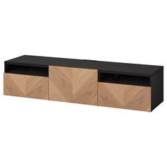 a black and oak entertainment center with two doors on one side and three drawers on the other