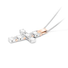 A beautiful symbol of your faith, this shimmering white and rose gold cross pendant is a look you'll wear with everything. Crafted in 18K gold, this timeless choice showcases dazzling diamonds lining a simple cross shape.  A fashionable look she'll adore and wear daily as well as on special occasions. The perfect gift for an anniversary.
2.98 carat Round cut diamonds Cross
color: D-Fclarity: VS-SI
18k white and rose gold

We offer a Free virtual Consultation from the comfort of yo White Diamond Cross Pendant Necklace, White Crucifix Cross Necklace With Brilliant Cut, White Cross Necklace With Diamond Accents, White Brilliant Cut Cross Pendant Necklace, Virtual Consultation, Zipper Bracelet, Cross Shape, Simple Cross, Beautiful Symbols