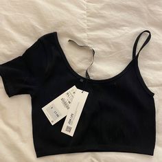 Size M/L Perfect Never Worn Condition Black Seamless Crop Top For Spring, Black Seamless Tops For Summer, Black Scoop Neck Top For Spring, Zara Chic Everyday Tops, Chic Everyday Zara Tops, Chic Zara Tops For Everyday, Black Everyday Summer Tops, Black Summer Tops For Everyday, Black Scoop Neck Top For Everyday