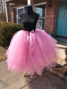 "This listing includes a solid dusty mauve (rosy mauve) tutu for waist sizes 35\" up to 45\"can be made larger if interested contact me for a special listing. Other colors also available. The dusty rose tutu is the 25\"-30\" length range with a longest layer of 30\" and top layer of 25\". The last picture which is a black tutu is the 13-18\" length range with a 15\" tutu with a top layer that is 12\". Tutu can be all one length or the dual lengths. **please just note the length you would like or Pink Tiered Petticoat With Attached Cancan, Pink Tulle Skirt For Costume Party, Pink Princess Tulle Skirt, Pink Tulle Princess Skirt, Princess Style Pink Tulle Skirt, Pink Tulle Petticoat For Wedding, Party Petticoat With Attached Cancan In Pink, Pink Tulle Skirt For Wedding, Pink Tulle Petticoat For Costume Party