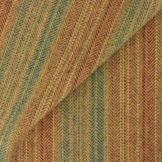 a close up view of a fabric with multicolored stripes on the top and bottom