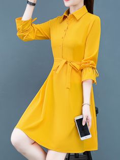 Composition:95% Polyester,5% SpandexMaterial:PolyesterLength:MidiSleeve Length:Long SleeveSleeve Type:Flutter sleeveHem Shaped:FlaredDetails:ButtonPatterned:Solid colorApplicable People:AdultSheer:NoDresses Length:MidiSilhouette:TentCollar Style:LapelType:A PendulumSeasons:Spring/FallCare Instructions:Machine wash, do not dry cleanStyle:Elegant ProjectFabric Elasticity:Micro ElasticityPrinting Type:No PrintingWeaving Method:WovenItem ID:WQ40265 There maybe 1-2 cm deviation in different sizes, lo Collared Midi Dress In Solid Color, Long Sleeve Office Lady Dress With Button Closure, Casual Long Sleeve Yellow Shirt Dress, Casual Yellow Long Sleeve Shirt Dress, Casual Mini Length Long Sleeve Dress For Work, Casual Long Sleeve Mini Dress For Work, Yellow Long Sleeve Midi Dress, Yellow Casual Shirt Dress For Work, Casual Yellow Shirt Dress For Work