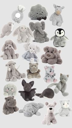 many different stuffed animals are arranged together