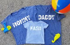 This listing is for two super soft comfy shirts with Mommy and Daddy shark designs and one short sleeve kids T-shirt with a custom personalized name design on it with sharks .  The Womens shirt is available in a dolman style as pictured, crew neck t-shirt or vneck t-shirt.  The Mens shirt is available in a vneck, as pictured or crew neck. Available colors: Black White Charcoal Heather Gray Navy Military Green Pink Red Royal Blue Baby blue Turquiose Mint These tops are true to sizing. Please also Customizable Blue Tops For Family Occasions, Playful Blue Tops With Name Print, Fun Blue Tops With Name Print, Fun Blue Top With Name Print, Mommy Shark, Baby Shark Birthday, Mommy And Me Shirts, Mom Dad Baby, Mommy And Me Shirt