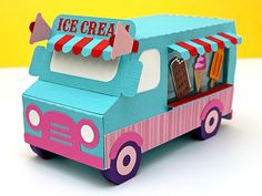 an ice cream truck is made out of cardboard