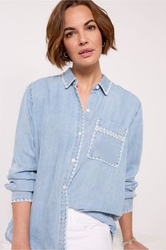 Embroidered trim adds a stylish touch to the Saya button-down by Rails, crafted in soft Tencel denim with a relaxed fit, left chest pocket, and curved hem. Wear with cargo pants or cutoffs, or leave it open with a tank and jeans. Spring Medium Wash Denim Top With Patch Pockets, Casual Denim Top With Patch Pockets For Spring, Summer Denim Top With Patch Pockets, Summer Denim Tops With Patch Pockets, Light Wash Spring Top With Patch Pockets, Light Wash Tops With Patch Pockets For Spring, Spring Denim Blue Tops With Patch Pockets, Rails Clothing, Tencel Denim