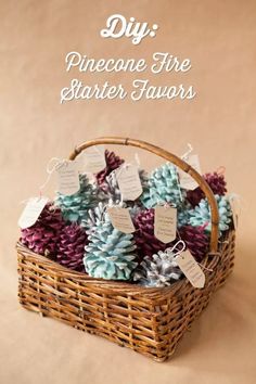 pinecone fire starter favors in a wicker basket with tags attached to them