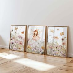 three framed pictures on the wall in an empty room with wood floors and hard wood flooring