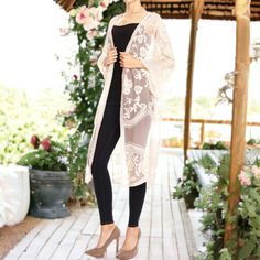 Embrace bohemian elegance with the Anna-Kaci Embroidered Floral Butterfly Duster Cover Up Cardigan. This long maxi duster cardigan features intricate embroidery and a sheer lace design, providing the perfect blend of modesty and allure for any occasion. With its loose fit, open front, and extra-large armholes, it flatters all body types and adds a dramatic, flowy touch to your outfit. Bohemian Beige Outerwear For Day Out, Beige Bohemian Outerwear For Day Out, Fitted Open Front Kimono For Spring, Bohemian Summer Outerwear For Brunch, Bohemian Cream Kimono For Spring, Cream Bohemian Kimono For Spring, Long Cream Spring Kimono, Bohemian Long Spring Outerwear, Long Spring Festival Outerwear