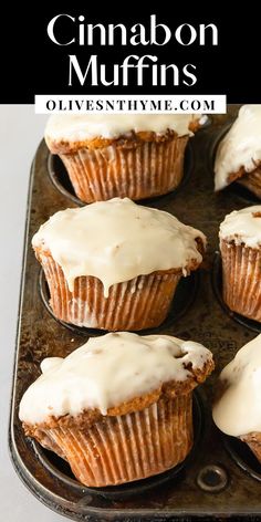 cinnamon muffins with white icing on a baking tray and title overlay