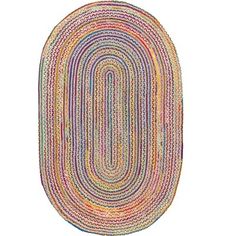 the oval rug is multicolored and has an oval design on it's side